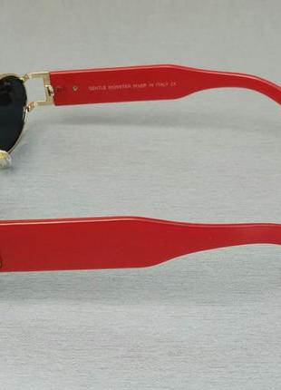 Gentle monster окуляри унісекс модні вузькі овальні чорні в золоті дужки червоні3 фото