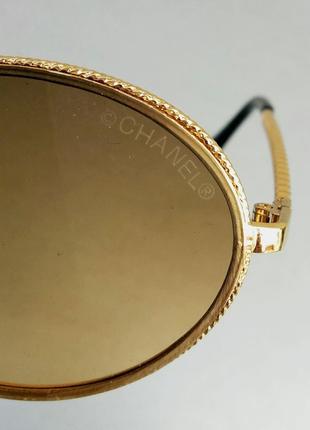 Очки в стиле chanel женские солнцезащитные модные овальные коричнево бежевый градиент в золотом металле8 фото