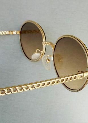 Очки в стиле chanel женские солнцезащитные модные овальные коричнево бежевый градиент в золотом металле7 фото