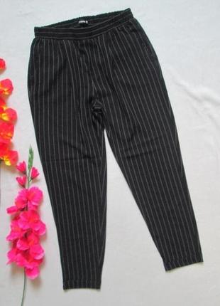 Шикарные летние легкие укороченные брюки в полоску с подкотами chicoree.1 фото