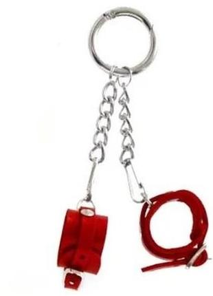 Брелок наручники с пряжкой красный--so37761 фото