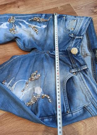 Очень красивые модные джинсы в камнях с дырками низкая посадка8 фото