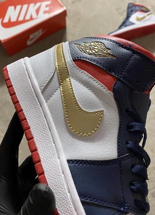 Мужские кроссовки nike air jordan 1 retro mid blue gold3 фото