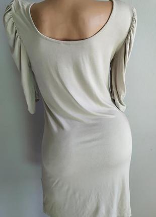 Трикотажное платье с фактурными рукавами.2 фото