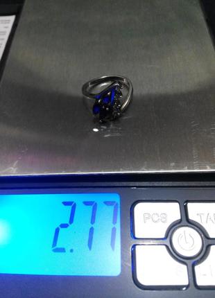 Серебряное кольцо с аметистами и цирконами 16 размер