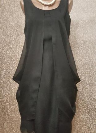 Шикарное черное платье.2 фото