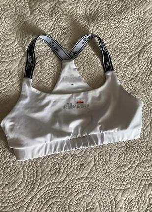 Топ ellesse