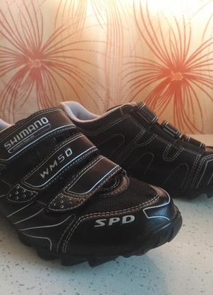 Велотуфлі shimano з шипами.