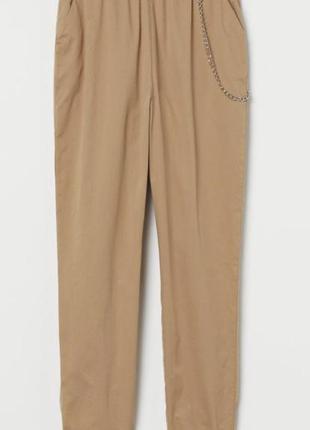 Жіночі брюки бежевого кольору от h&m
