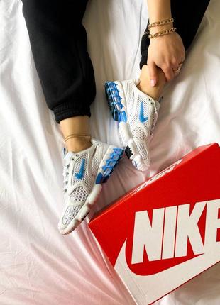 Чоловічі кросівки stussy nike air zoom spiridon caged 2 white university blue,стусси найк аїр зум спиридон кагед білий з синім шнурівка6 фото