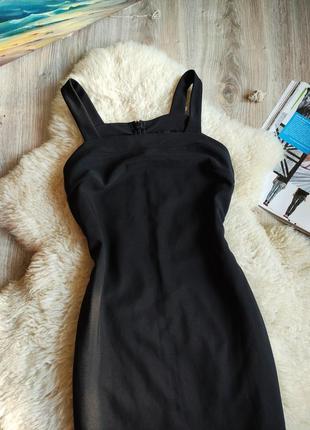 Чёрное платье в обтяжку по фигуре с лампасами , платье с колечками . сукня3 фото