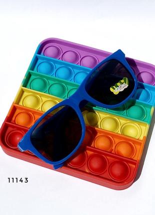 Дитячі сонцезахисні окуляри у синій оправі + pop it в подарунок к. 111434 фото