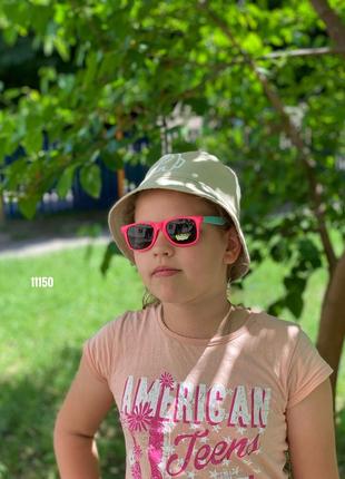 Дитячі сонцезахисні окуляри в рожевій оправі з блакитними дужками + pop it в подарунок к. 111505 фото