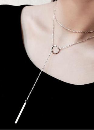 Довга срібляста ланцюжок з колом і пластинной намисто чокер