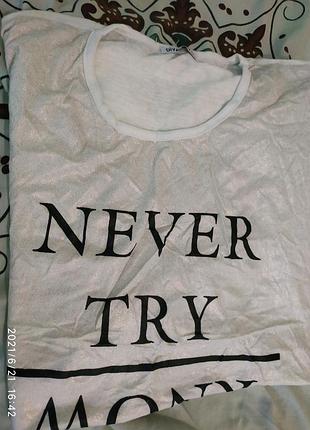 Шикарна футболка,переливається,пог 52.