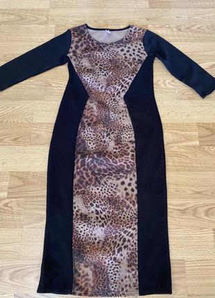 Шикарное платье подчеркивающее талию.