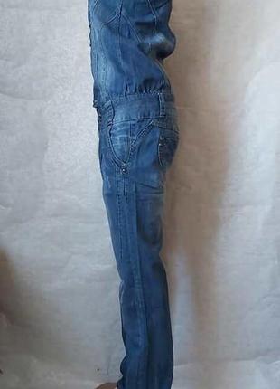 Крутий джинсовий комбінезон з заводськими затертостями і дірками, розмір с-м4 фото