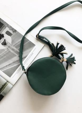 Кругла сумочка зелена1 фото