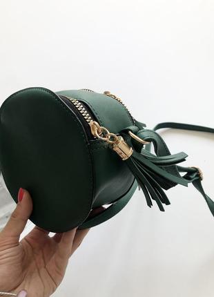 Кругла сумочка зелена2 фото