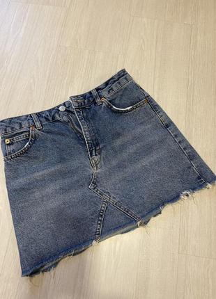 Спідниця джинсова з необробленим краєм1 фото