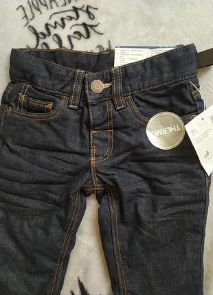 Шикарні джинси на флісі, унісекс. з бірками2 фото
