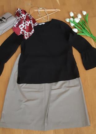 Блузка черная