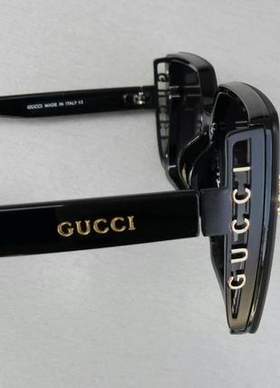 Gucci очки стильные женские солнцезащитные большие черные с золотым логотипом8 фото