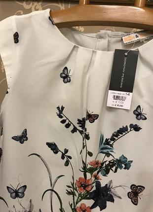 Нереально красива і стильна брендовий блузка в кольорах і метеликах.5 фото