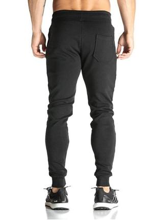Cпортивные мужские штаны на манжете черные2 фото