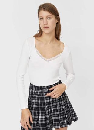 Ніжна молочна кофта в рубчик stradivarius