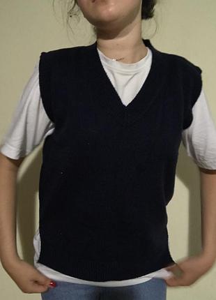 В'язана жилетка