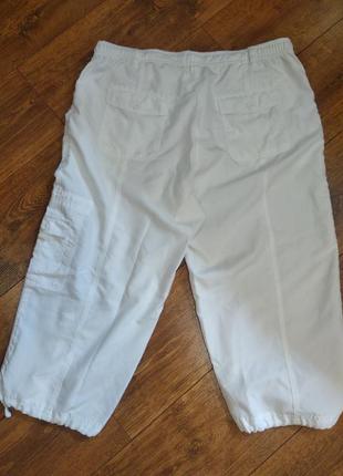 Белоснежные брюки бриджи капри, с высокой посадкой.2 фото
