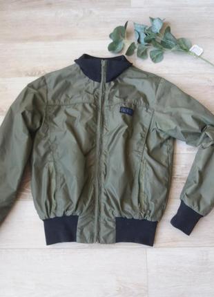 Коротка куртка-бомбер хакі yell!