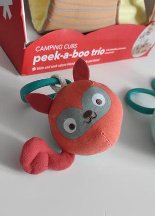 Skip hop peek-a-boo trio іграшка сортер бразкальце (єнот+білка+зайчик)7 фото