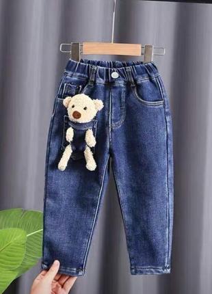 Джинси з іграшкою