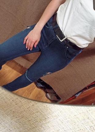 Штани джинси з розрізами на колінах1 фото