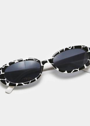 Овальные солнцезащитные очки с коровьим принтом 20212 фото