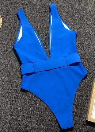 Сдельный купальник пландж с поясом синего цвета4 фото