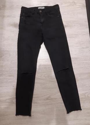 Стрейчевые джинсы (рваные) с прорезами на коленях2 фото