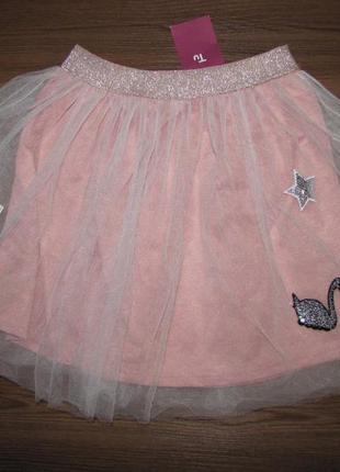 Модна спідниця з нашивками