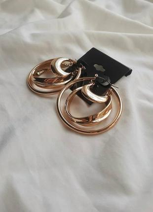 Сережки з потрійними кольцами