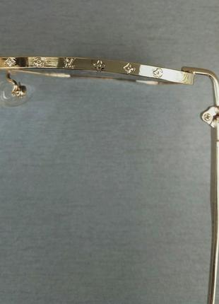 Louis vuitton очки женские солнцезащитные темно серый градиент в золотом металле6 фото