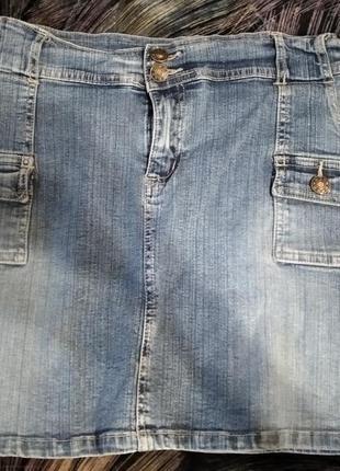 Джинсовая юбка мини с карманами1 фото