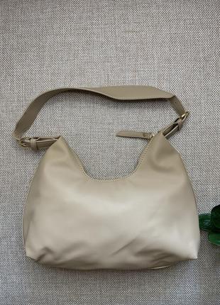 М'яка кремова сумка