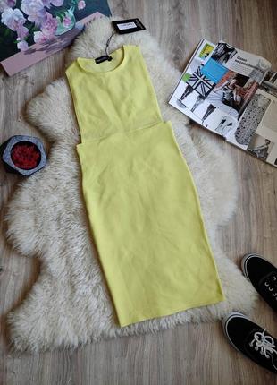Жёлтое бандажное платье мини по фигуре в рубчик .5 фото