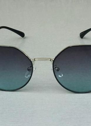 Valentino стильні жіночі сонцезахисні окуляри синьо сірий градієнт в чорно сірої металевій оправі2 фото