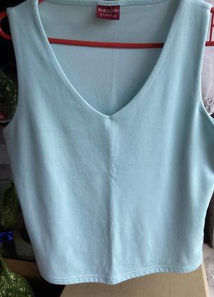 Блузка без рукавов