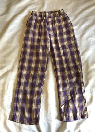 Фіолетові широкі штани в клітку1 фото