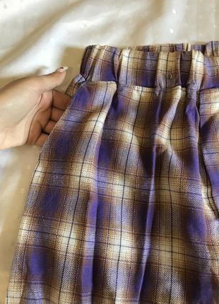 Фіолетові широкі штани в клітку4 фото
