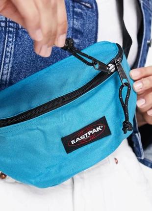 Поясна нагрудна сумка eastpak springer блакитна